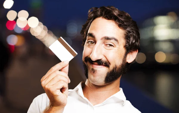 Young cool man with credit card — Stock Photo, Image