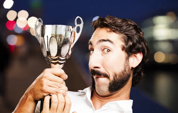 Young cool man with a sport cup — Stock Photo, Image