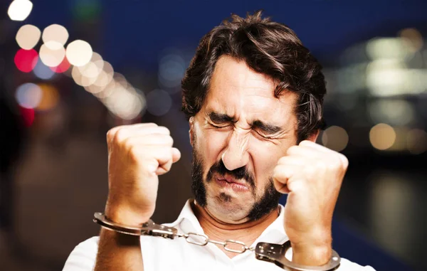 Young cool man with handcuffs — Stock Photo, Image