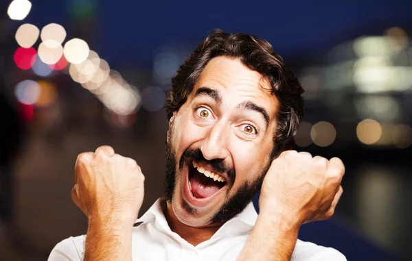 Young cool man in celebrating pose — Stock Photo, Image