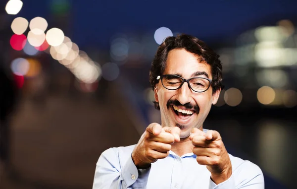 Young cool man pointing — Stock Photo, Image