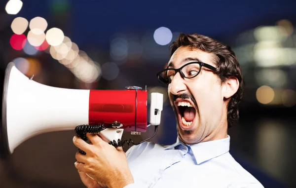 Jonge cool man met een megafoon — Stockfoto