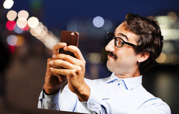 young cool man with a mobile phone