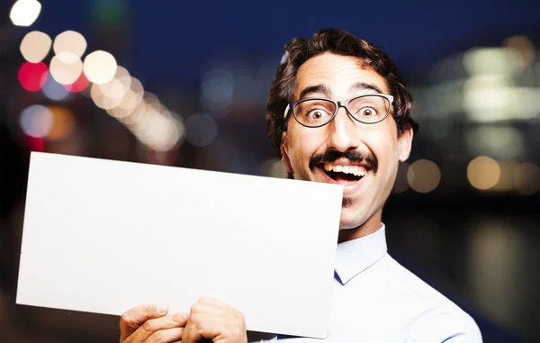 Joven fresco hombre con un cartel — Foto de Stock