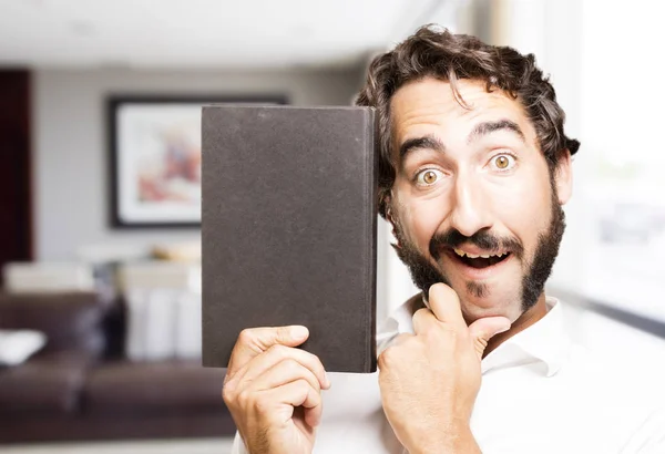 Joven guay hombre con un libro —  Fotos de Stock