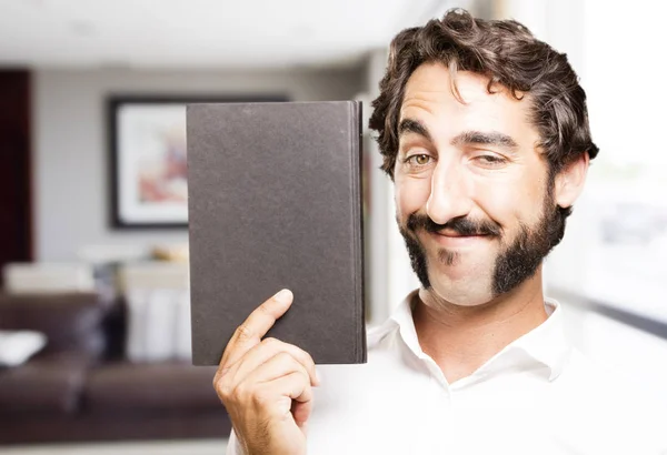 Young cool man with a book — Stock Photo, Image