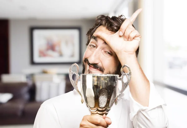Young cool man with a sport cup — Stock Photo, Image