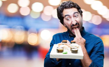 man yemek suşi kusmuk işareti ile