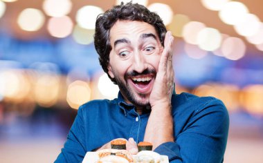 Genç adam yemek suşi