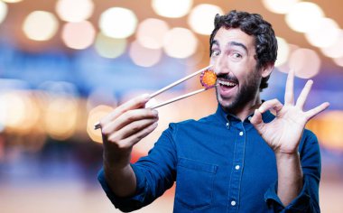 man yemek suşi Tamam işareti ile