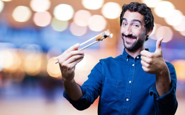 man yemek suşi Tamam işareti ile