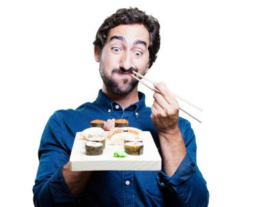 Genç adam yemek suşi