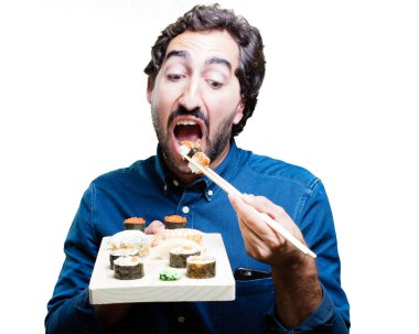 Genç adam yemek suşi