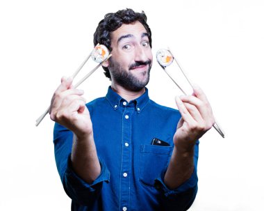 Genç adam yemek suşi