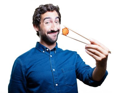 Genç adam yemek suşi