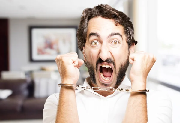 Young cool man with handcuffs — Stock Photo, Image