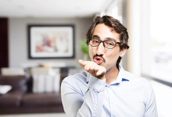 Young cool man with air kiss — Stock Photo, Image