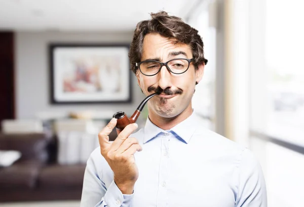 Joven fresco hombre con un tubo — Foto de Stock