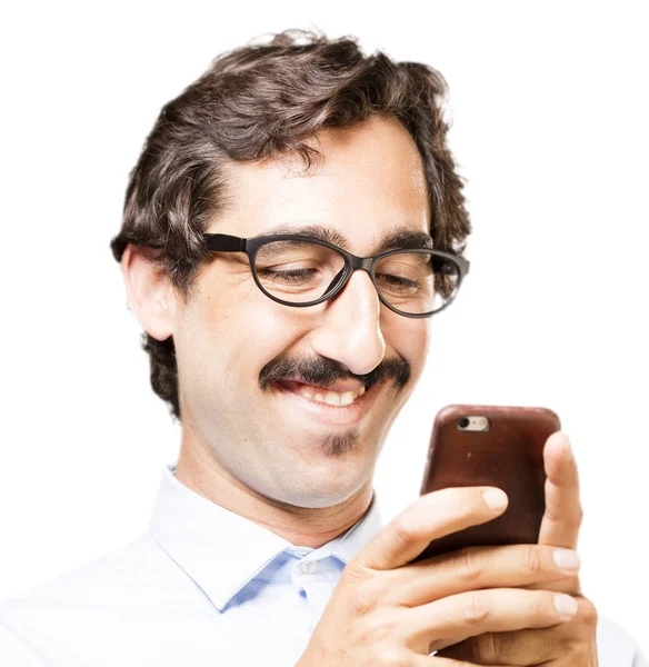 Joven hombre fresco con un teléfono móvil —  Fotos de Stock