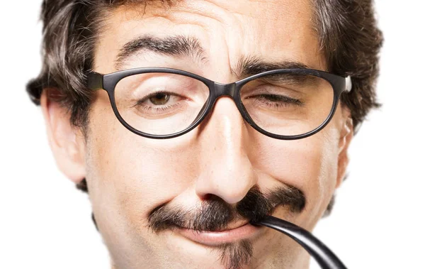 Young cool man with a pipe — Stock Photo, Image