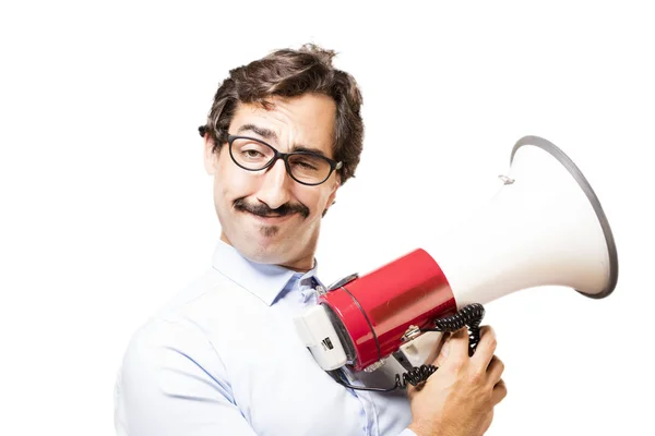 Jovem homem legal com um megafone — Fotografia de Stock