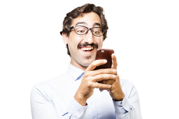 Młody człowiek fajny z telefonem komórkowym — Zdjęcie stockowe