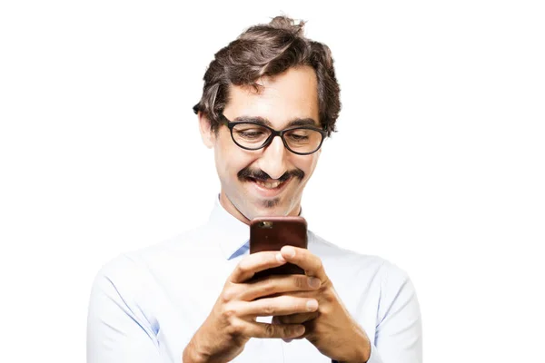 Jovem homem legal com um telefone celular — Fotografia de Stock