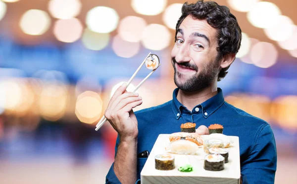 man eating sushi in all right pose