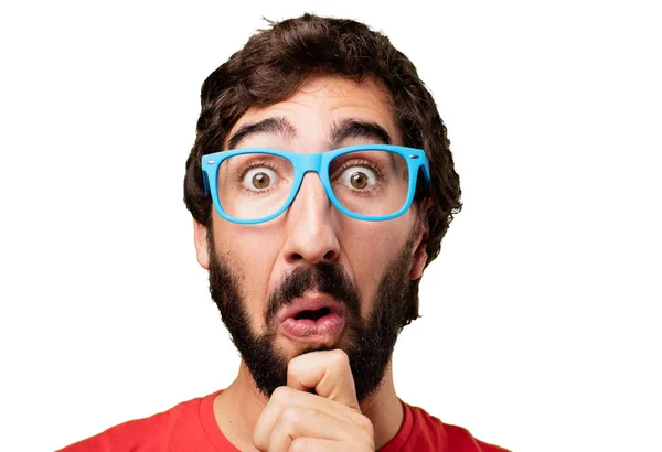 Young crazy man with doubting face — Stock Photo, Image