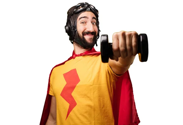 Crazy super hero with a dumbbell — Stock Photo, Image