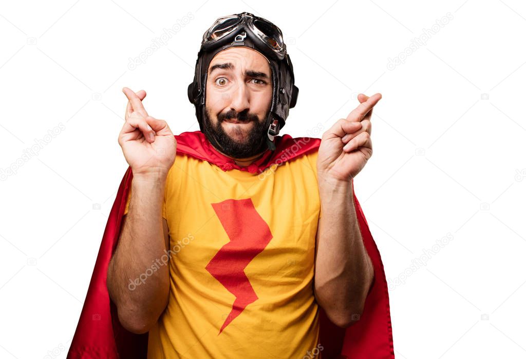 crazy super hero with finger crossing