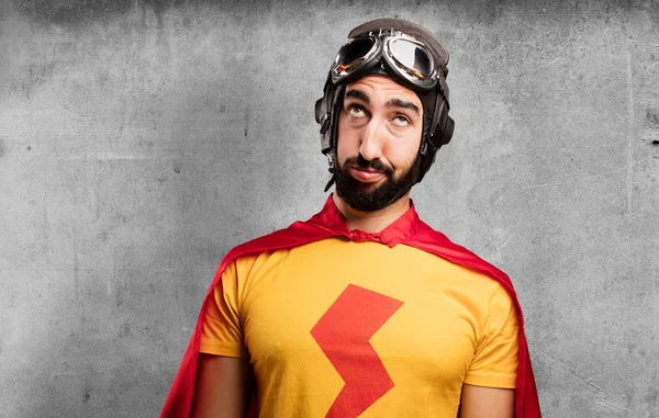 Crazy super hero with boring expression — Stock Photo, Image