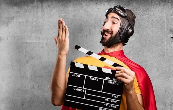 Crazy super hero with clapper — Stock Photo, Image