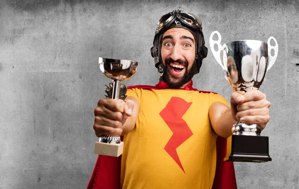 Crazy super hero with sport cups — Stock Photo, Image