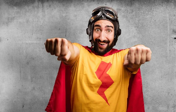Crazy super hero with fist sign — Stock Photo, Image