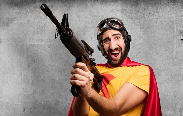 Super herói louco com uma arma — Fotografia de Stock