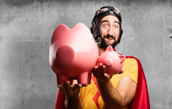 Божевільний супер герой зі свинячими банками — стокове фото