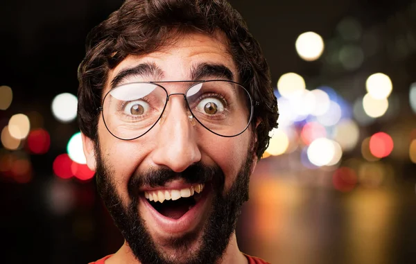 Young crazy man with surprised expression — Stock Photo, Image
