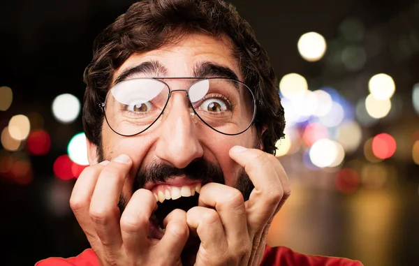 Young crazy man with scared expression — Stock Photo, Image