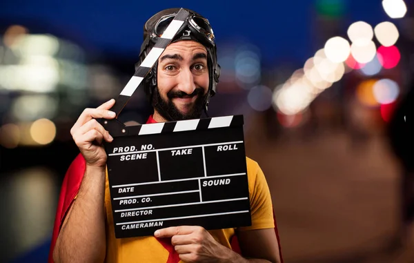 Crazy super hero with clapper — Stock Photo, Image