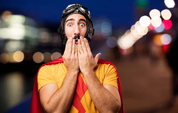 Crazy super hero covering mouth — Stock Photo, Image