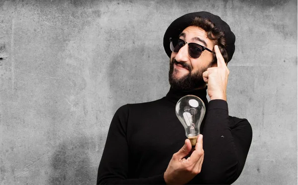 Jeune artiste français avec une ampoule — Photo