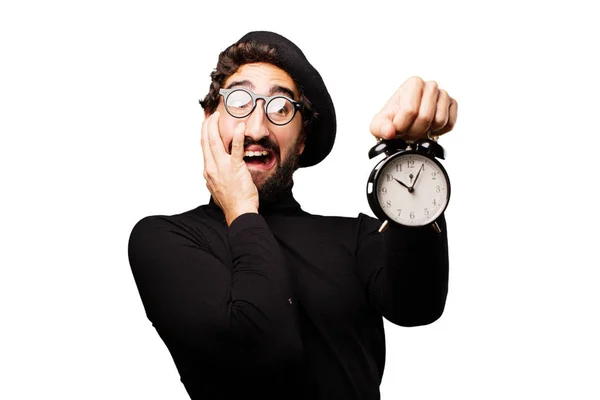Młody francuski artysta z zegarem — Zdjęcie stockowe