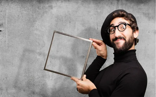 Young french artist with frame — Stock Photo, Image