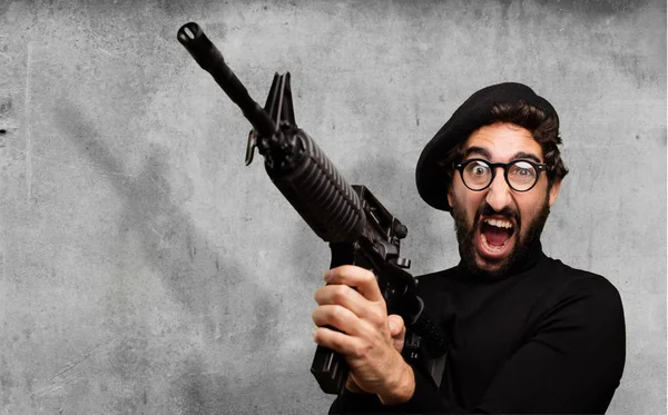Young french artist with a gun — Stock Photo, Image