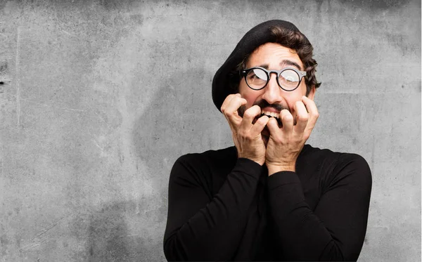 Young french artist with scared expression — Stock Photo, Image