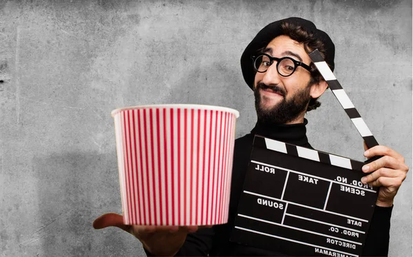 French artist with pop corn and clapperboard — Stock Photo, Image