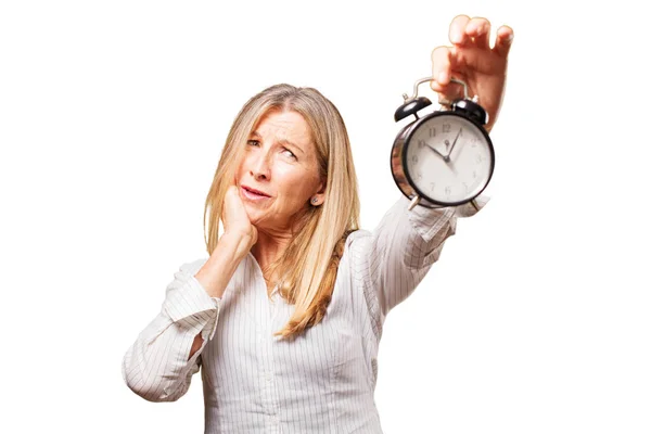 Anciano hermosa mujer con un reloj — Foto de Stock