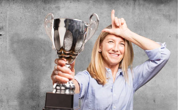 Senior beautiful woman with sport cup — Stock Photo, Image