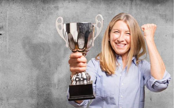 Senior beautiful woman with sport cup — Stock Photo, Image